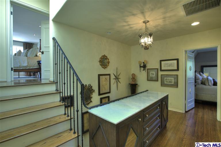 Undisclosed Address San Marino, CA 91108 - Photo 48 of 58 a view of a hallway with furniture and wooden floor