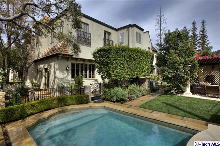 Undisclosed Address San Marino, CA 91108 - Photo 6 of 58 a front view of a house with a yard