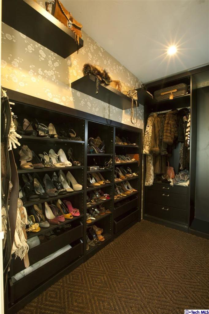 Undisclosed Address San Marino, CA 91108 - Photo 52 of 58 a room with lots of different colored cloths