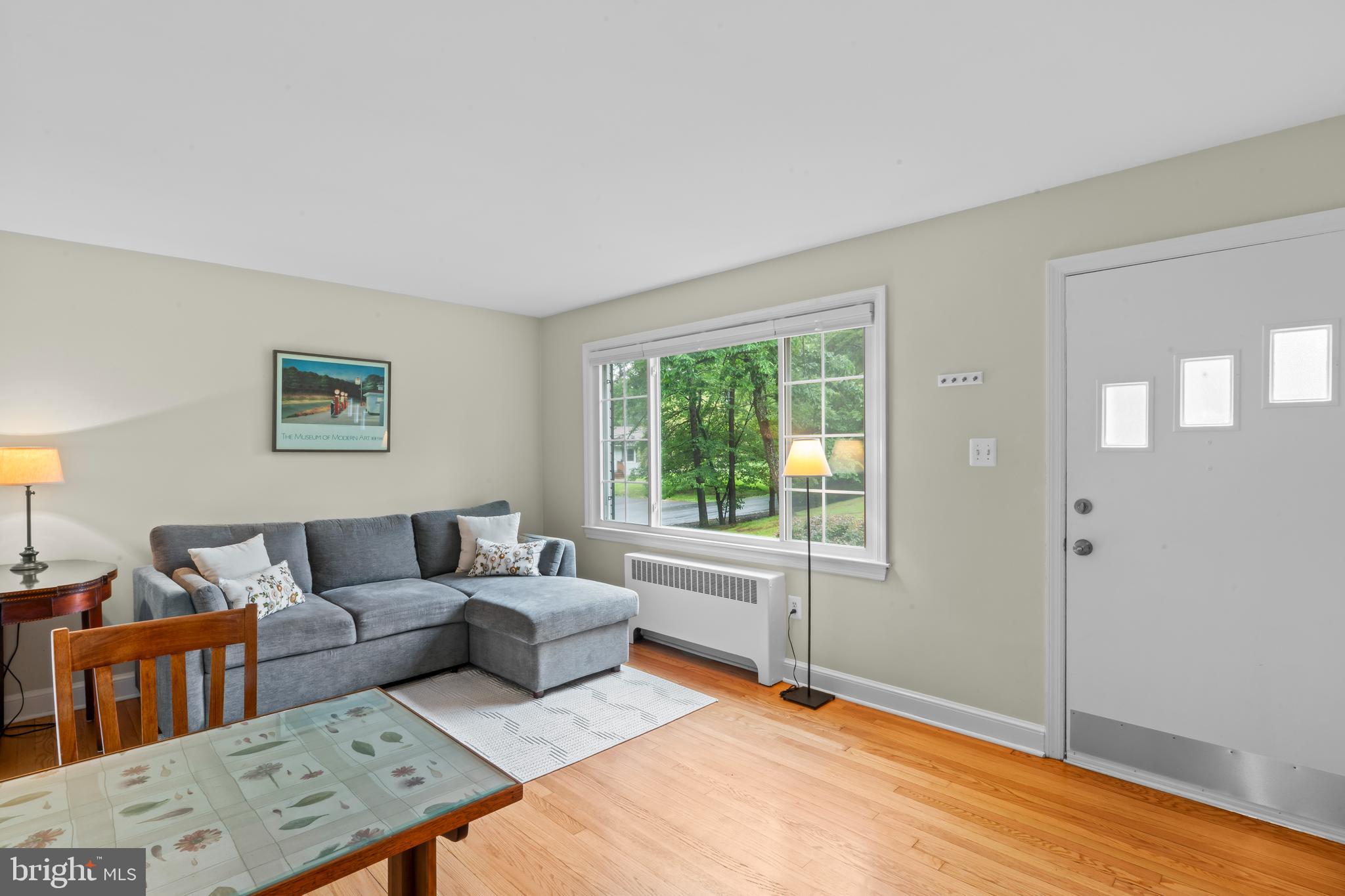 12131 Waples Mill Road Oakton, VA 22124 - Photo 6 of 40 a living room with furniture and a window