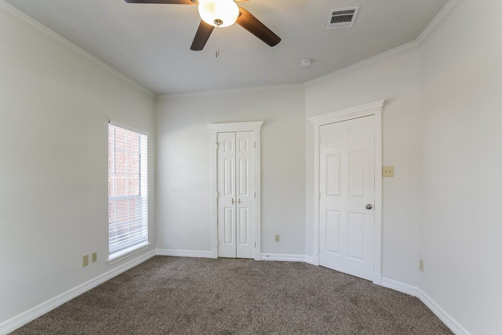 3407 El James Drive Spring, TX 77388 - Photo 10 of 17 an empty room with chandelier fan