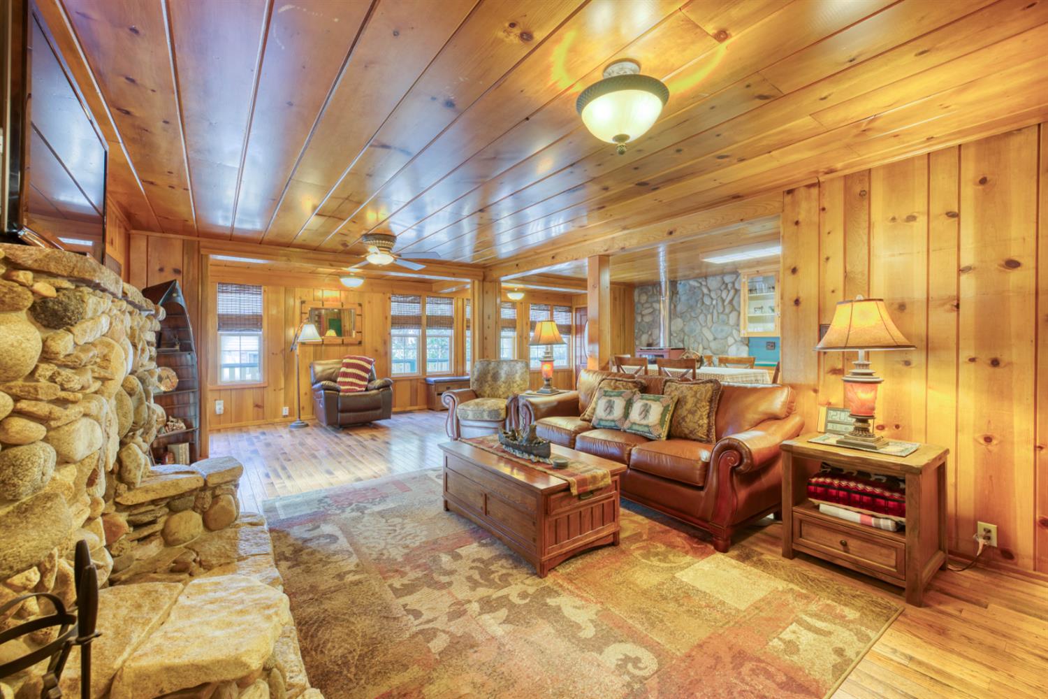 42025 Tollhouse Road Shaver Lake, CA 93664 - Photo 39 of 64 a living room with furniture and a large window