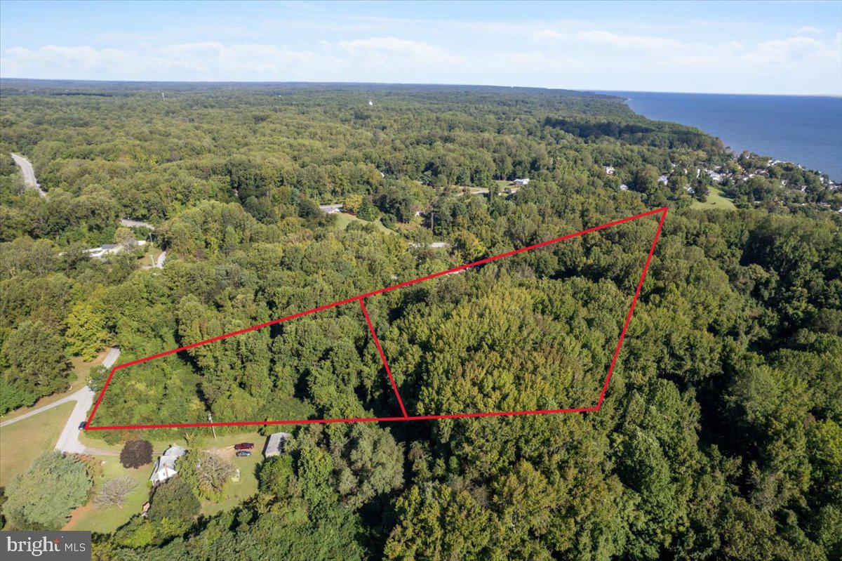 50 Goldstein Road Prince Frederick, MD 20678 - Photo 2 of 7 an aerial view of residential houses with outdoor space and trees