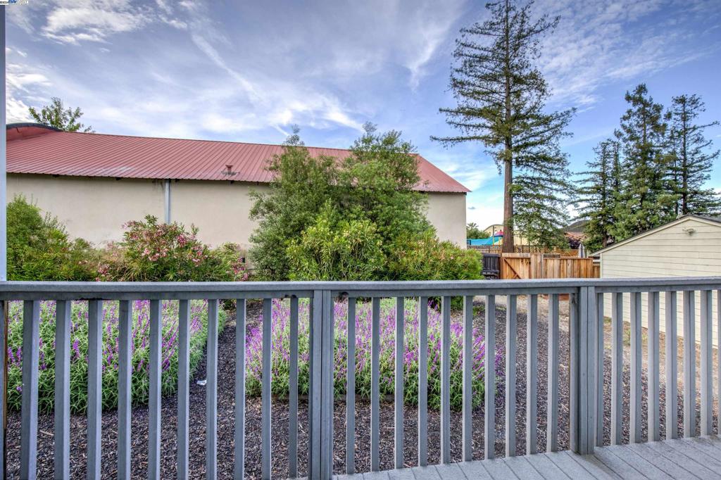 43301 Mission Boulevard Fremont, CA 94539 - Photo 11 of 30 a view of a wooden fence and a yard