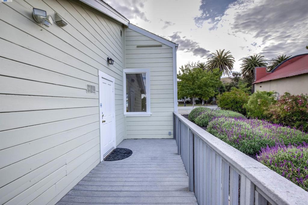 43301 Mission Boulevard Fremont, CA 94539 - Photo 12 of 30 a view of a wooden deck besides a house