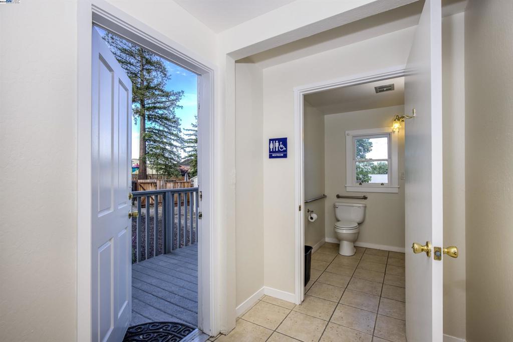 43301 Mission Boulevard Fremont, CA 94539 - Photo 18 of 30 a view of a hallway with a livingroom and a bathroom