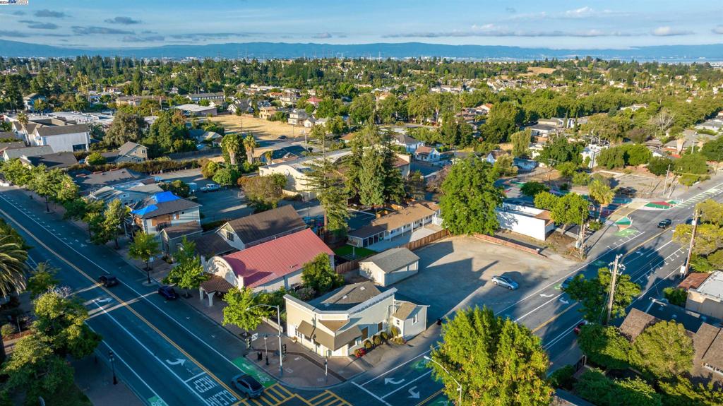 43301 Mission Boulevard Fremont, CA 94539 - Photo 29 of 30 an aerial view of residential houses with outdoor space and trees