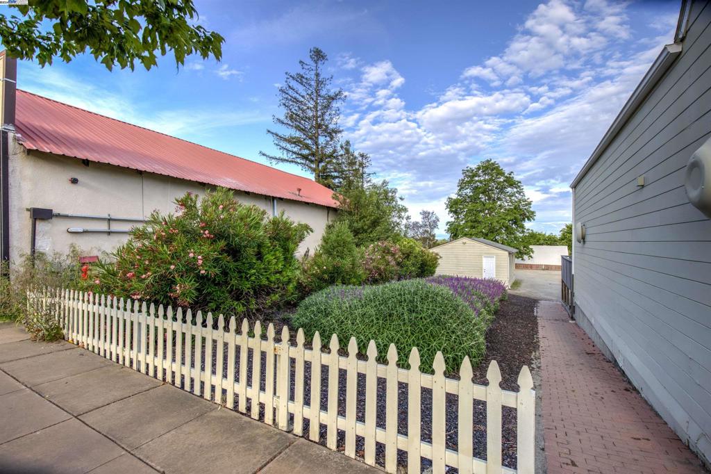 43301 Mission Boulevard Fremont, CA 94539 - Photo 6 of 30 a view of a house with a small yard