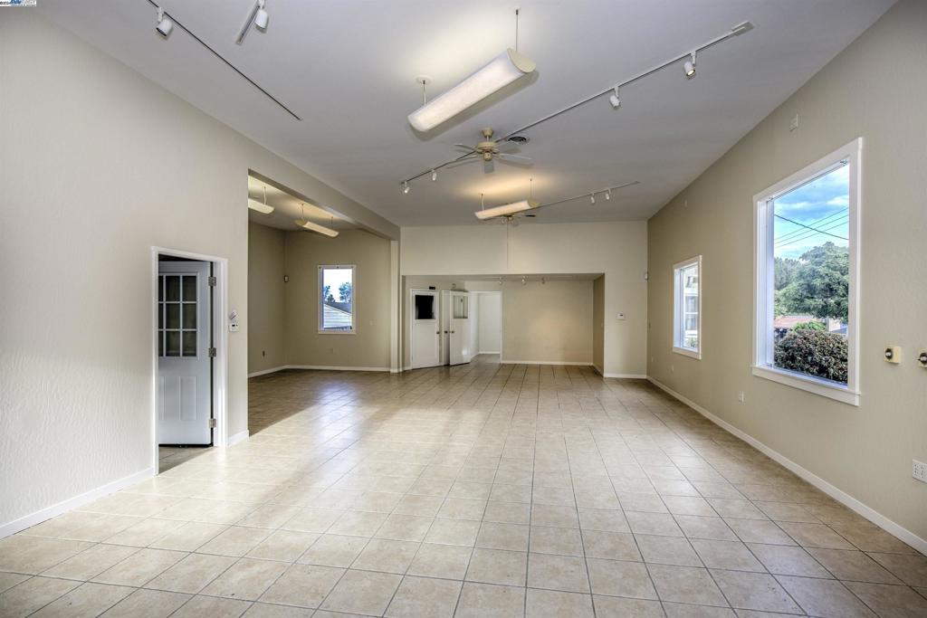 43301 Mission Boulevard Fremont, CA 94539 - Photo 9 of 30 a view of a livingroom with furniture and windows