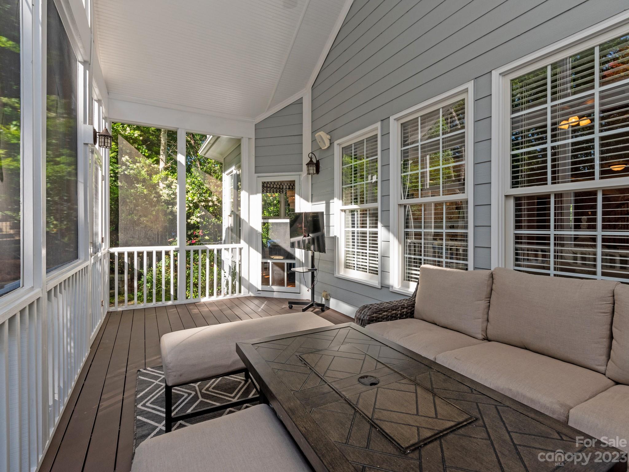 911 Stratford Run Drive Fort Mill, SC 29708 - Photo 11 of 45 a balcony view with a couch and wooden floor