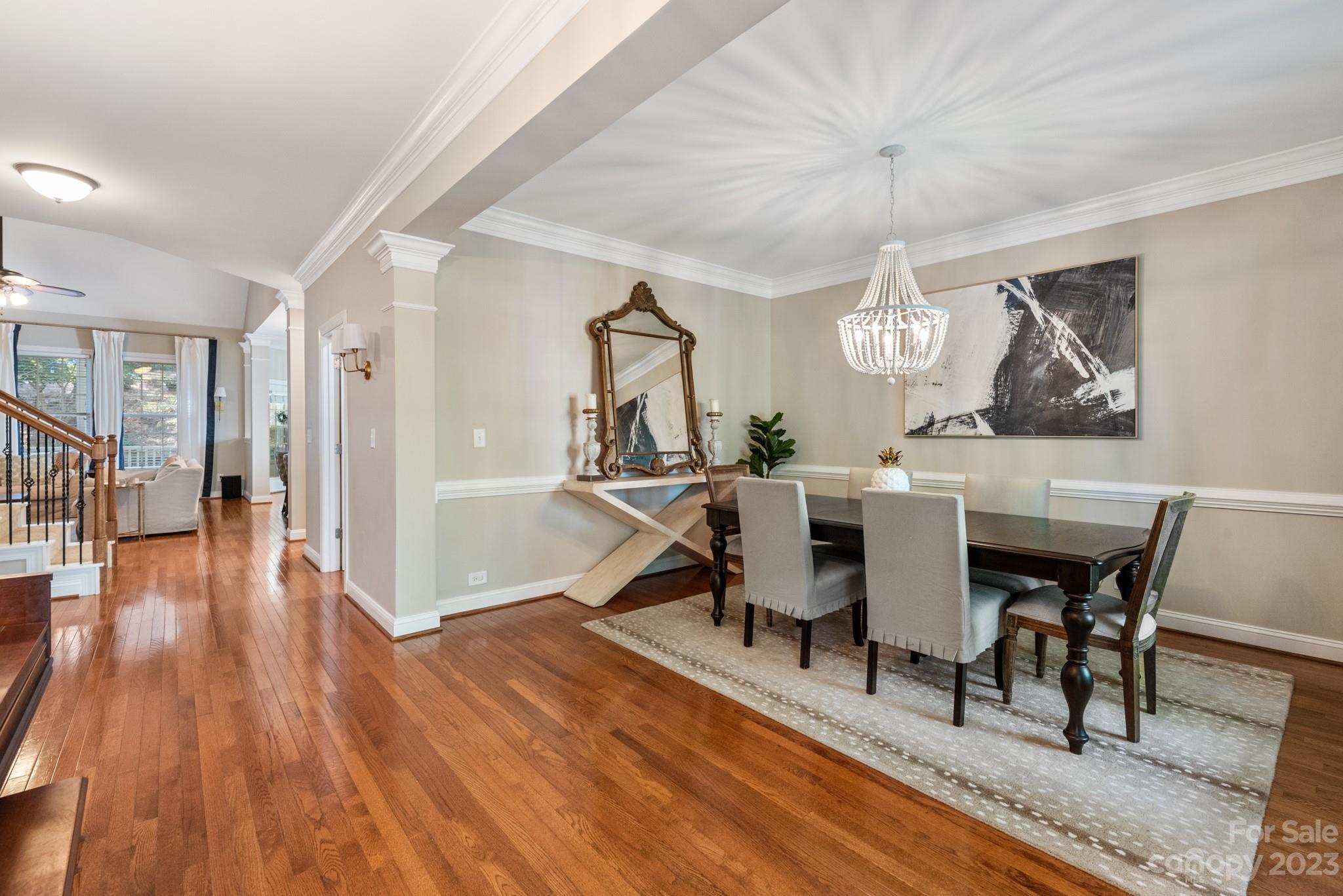 911 Stratford Run Drive Fort Mill, SC 29708 - Photo 14 of 45 a view of a dining room with furniture and wooden floor
