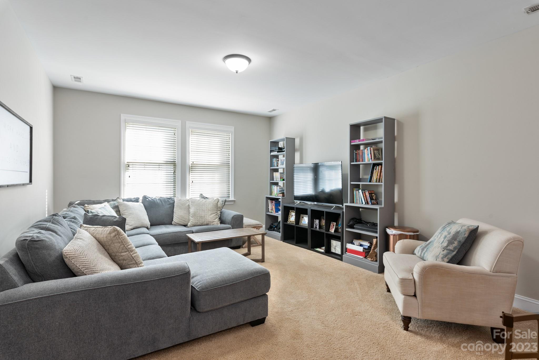 911 Stratford Run Drive Fort Mill, SC 29708 - Photo 35 of 45 a living room with furniture and a window