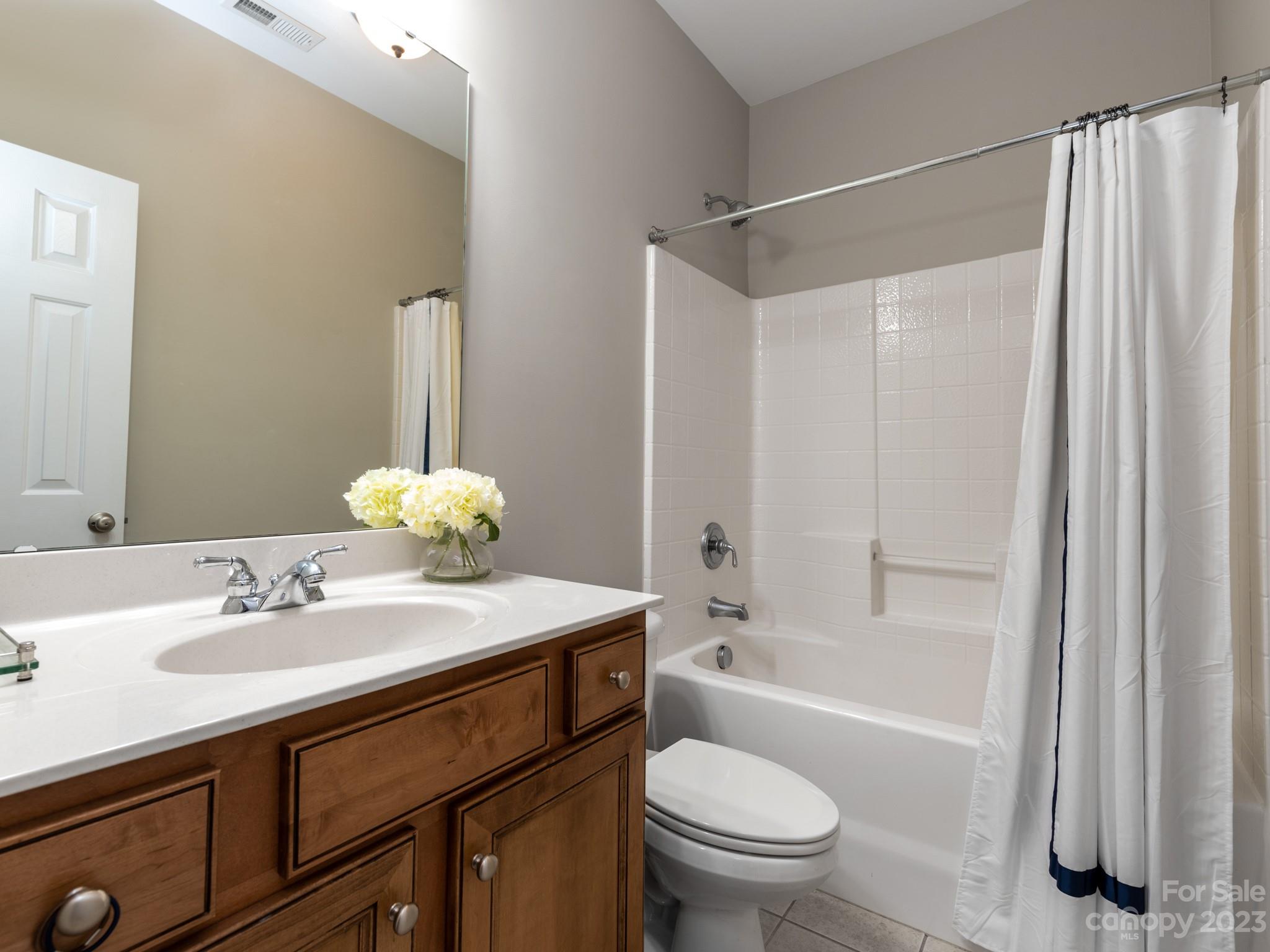 911 Stratford Run Drive Fort Mill, SC 29708 - Photo 37 of 45 a bathroom with a sink toilet and shower