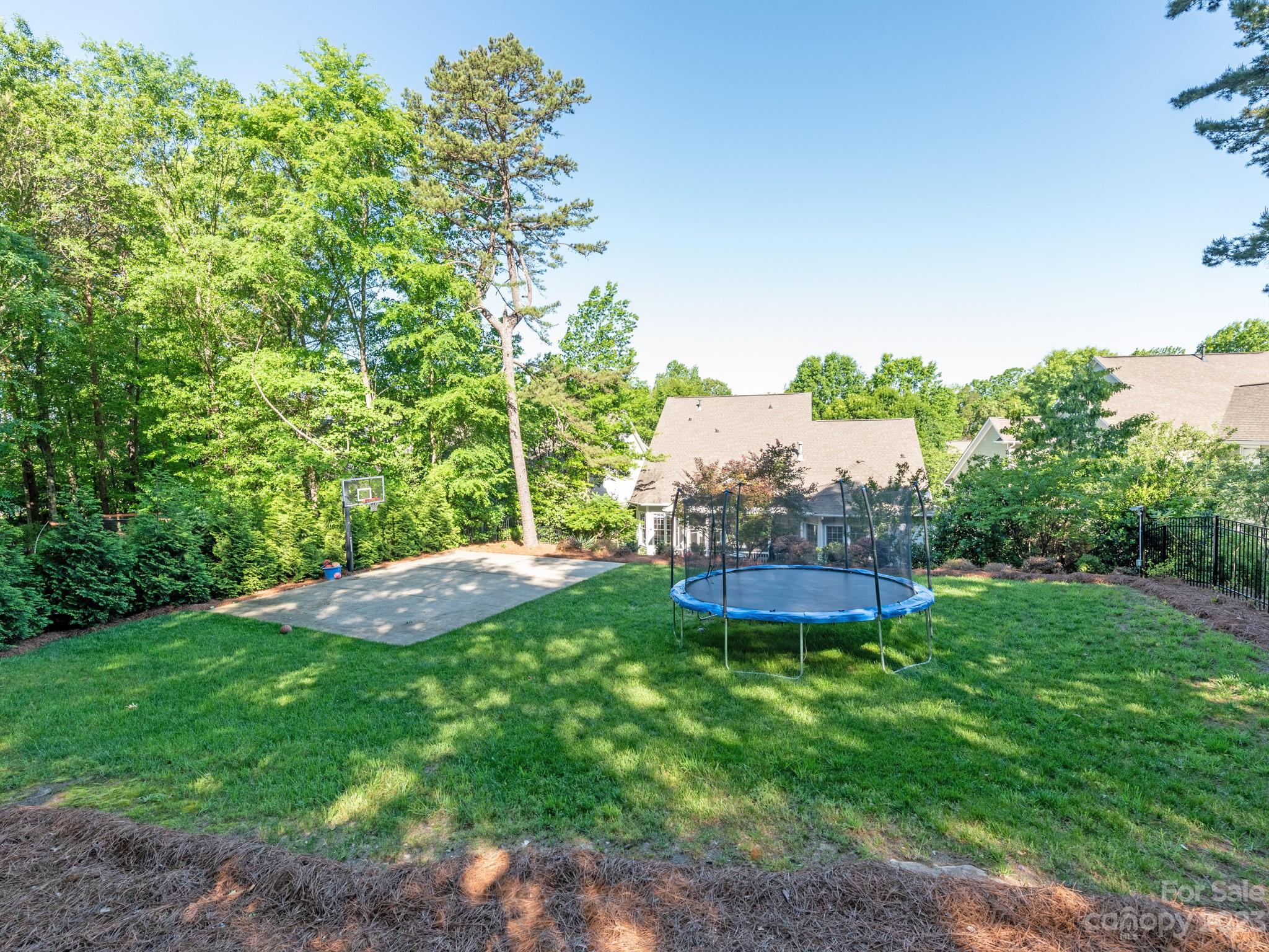 911 Stratford Run Drive Fort Mill, SC 29708 - Photo 41 of 45 a view of a backyard with plants and a garden