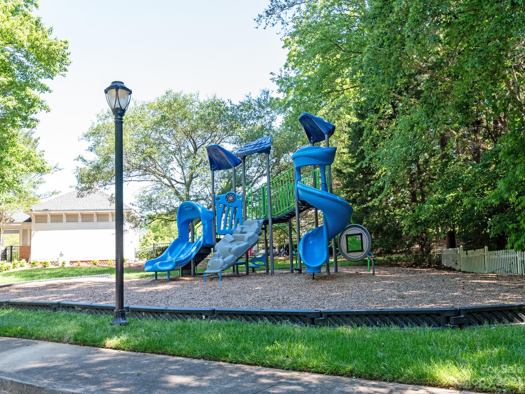 911 Stratford Run Drive Fort Mill, SC 29708 - Photo 45 of 45 a view of outdoor space with playground and green space