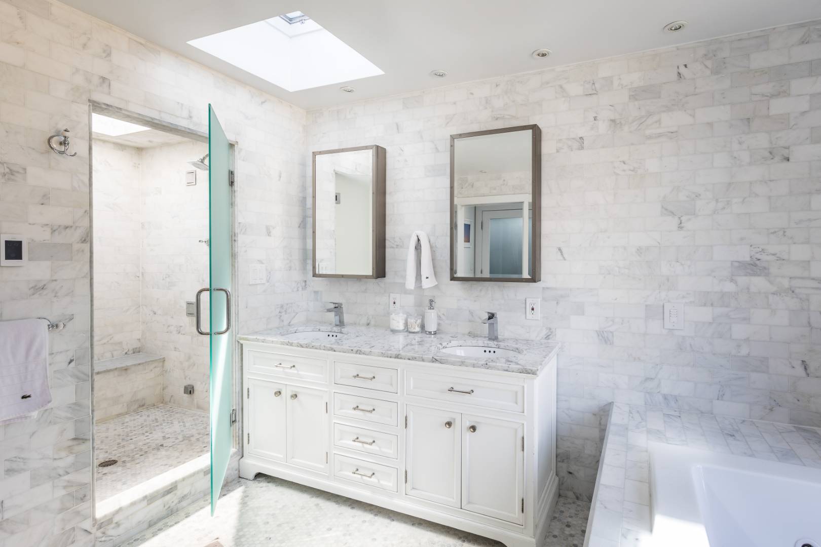 81 Neck Path East Hampton, NY 11937 - Photo 14 of 24 a bathroom with a double vanity sink mirror and shower