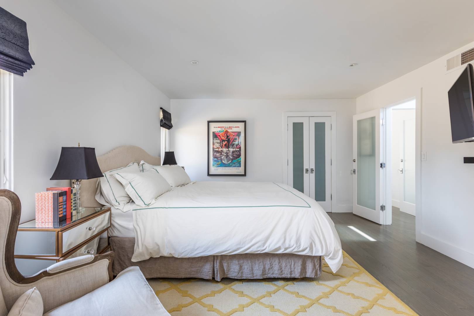 81 Neck Path East Hampton, NY 11937 - Photo 15 of 24 a bedroom with a bed and a couch