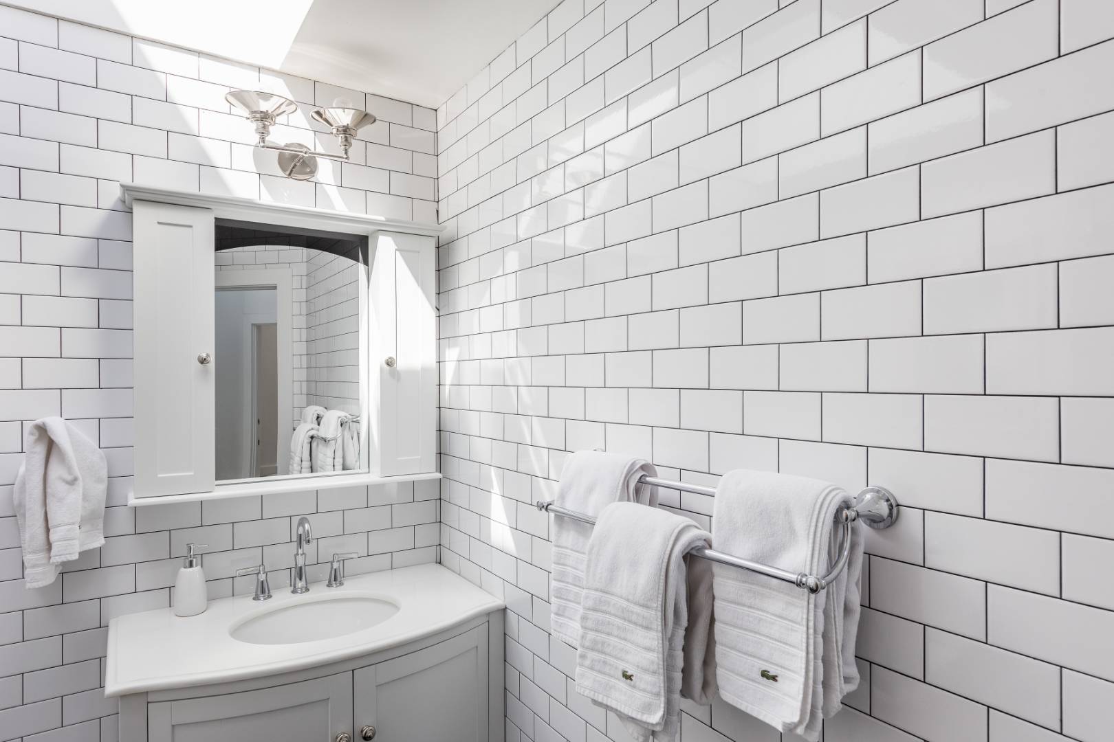 81 Neck Path East Hampton, NY 11937 - Photo 22 of 24 a bathroom with a sink mirror and vanity