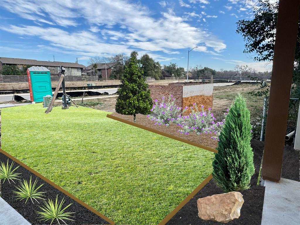 1205 Friends Cove Round Rock, TX 78681 - Photo 4 of 7 a view of a lake with a floor to ceiling window and wooden fence