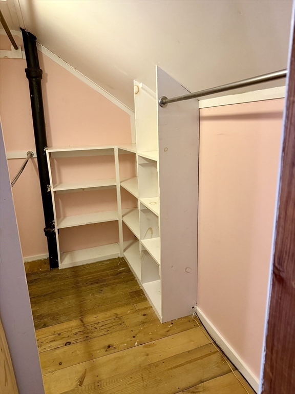 8 Union Road Wales, MA 01081 - Photo 24 of 37 a view of walk in closet with empty racks