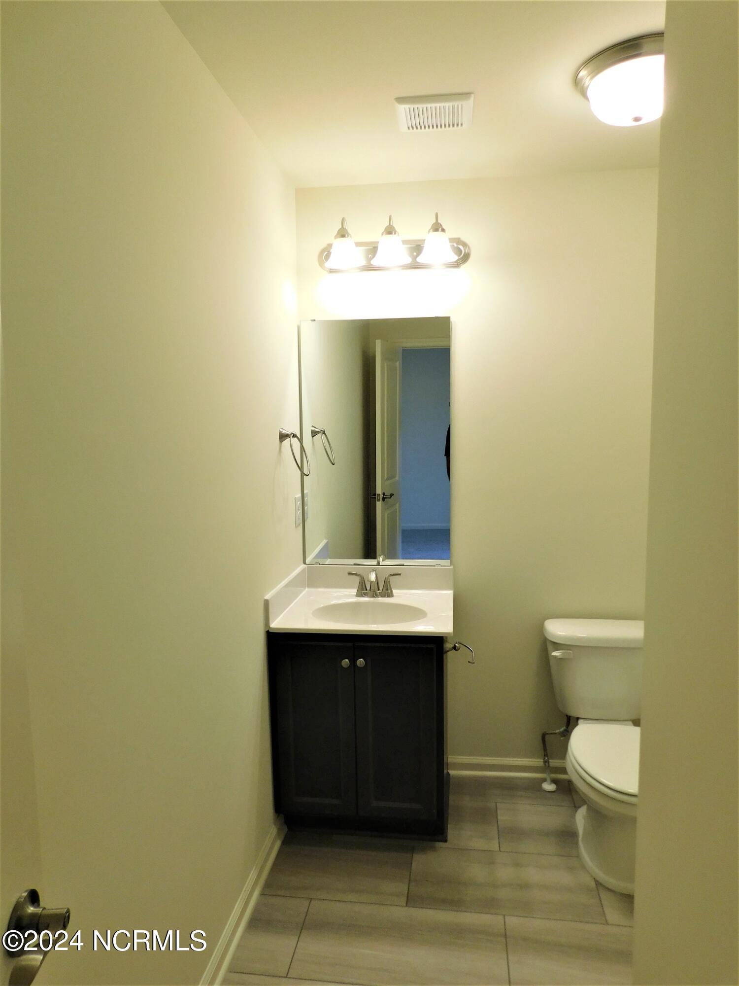 446 Sullivan Loop Road Midway Park, NC 28544 - Photo 17 of 20 Back Bedroom Bathroom