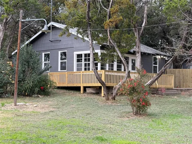a house view with a garden space