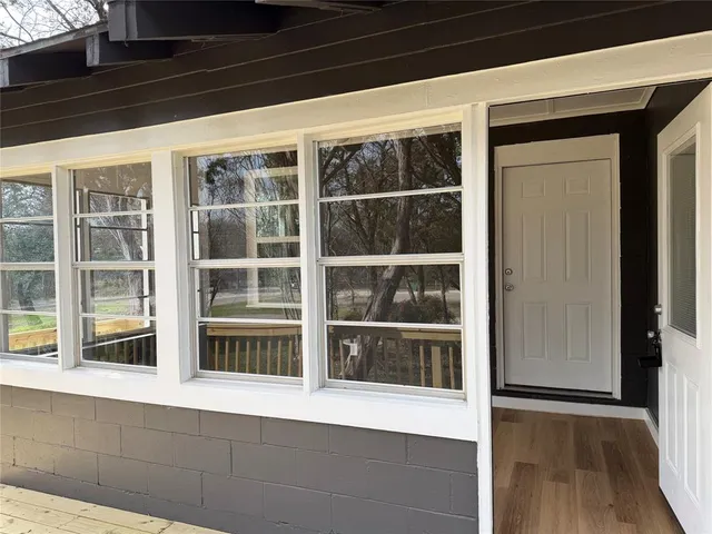 a view of a house with a large window