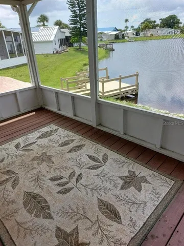 a view of swimming pool from a window