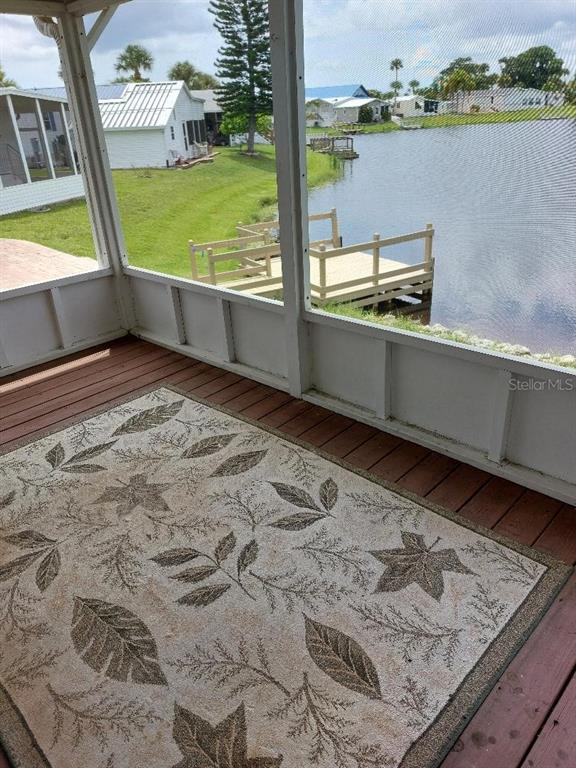 12531 Southeast 140th Avenue, Unit 118 Okeechobee, FL 34974 - Photo 3 of 26 a view of swimming pool from a window