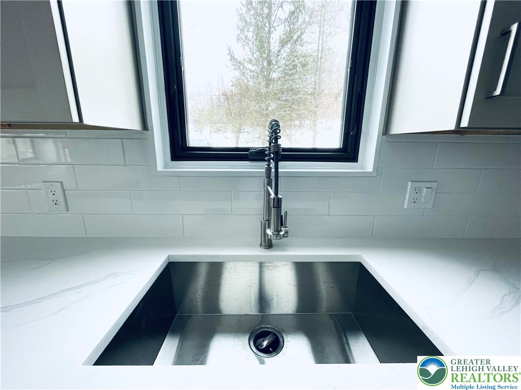 103 Ashley Court Bushkill, PA 18324 - Photo 6 of 68 Stainless steel sink paired with modern kitchen faucet