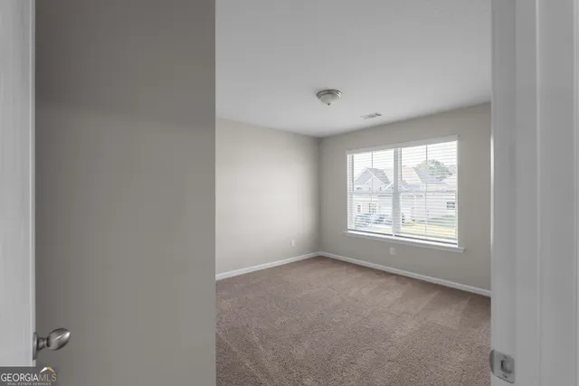 an empty room with a window