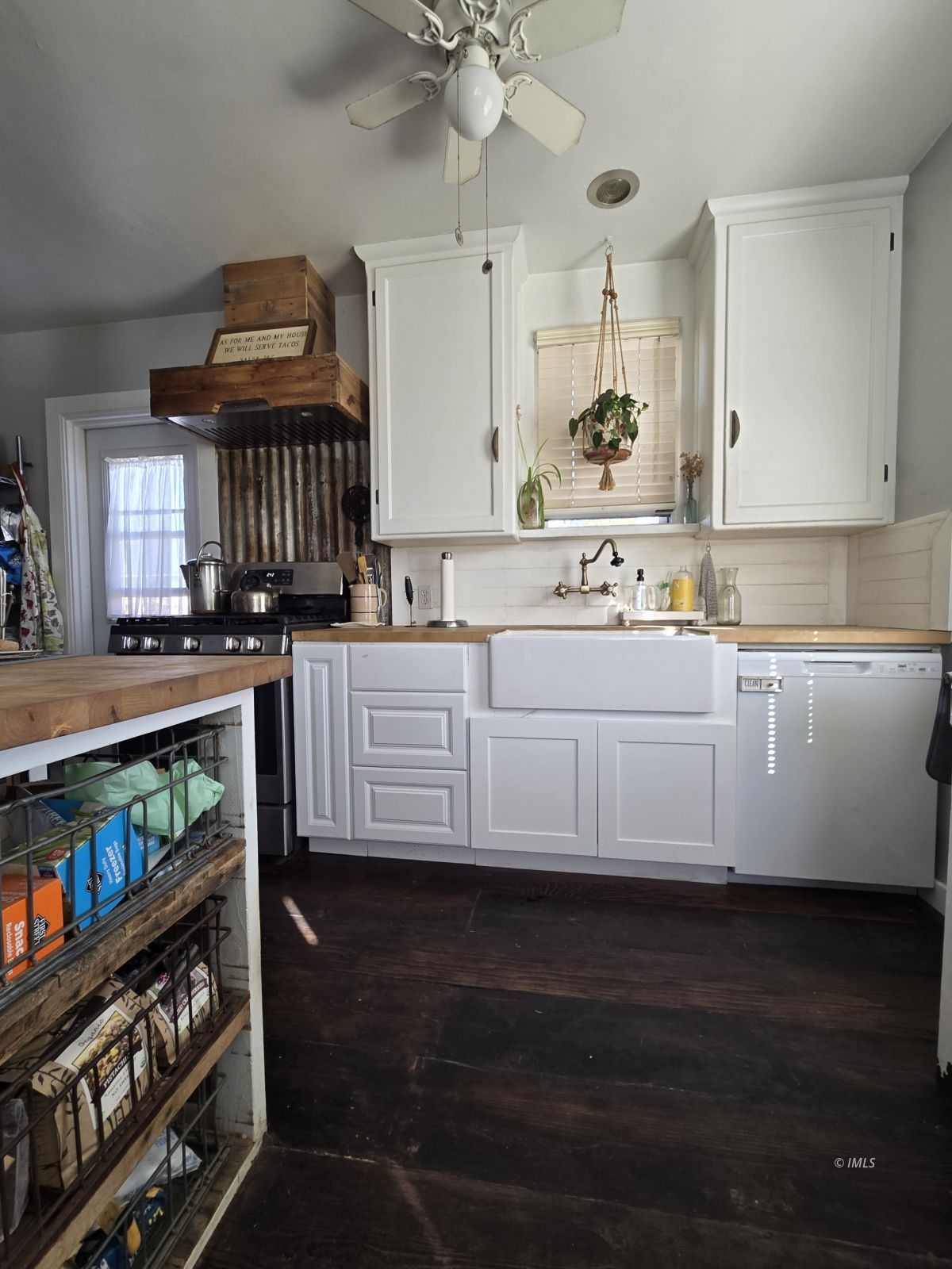 625 East Inyo Street Lone Pine, CA 93545 - Photo 7 of 16 a kitchen with stainless steel appliances a sink dishwasher stove and cabinets