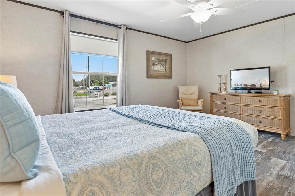 299 Puebla Road St. Augustine, FL 32080 - Photo 18 of 20 a bedroom with a bed and a window
