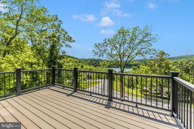 a bathroom with a sink toilet and mirror