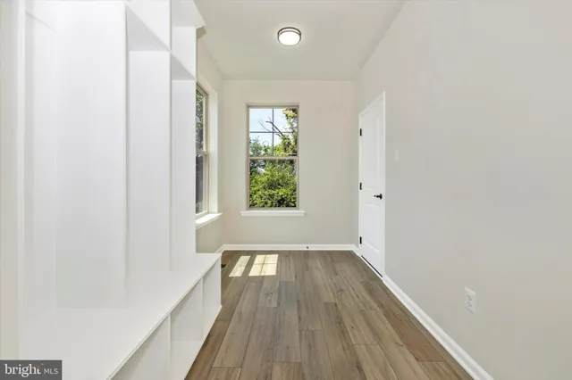 a view of a room with racks on the wall