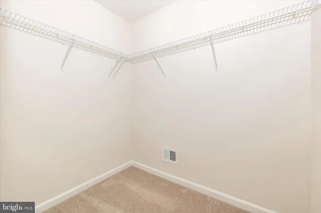 a view of small space with racks on the wall