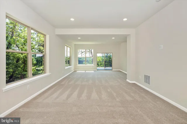 a view of a playground with a tree