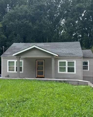 front view of house with a yard