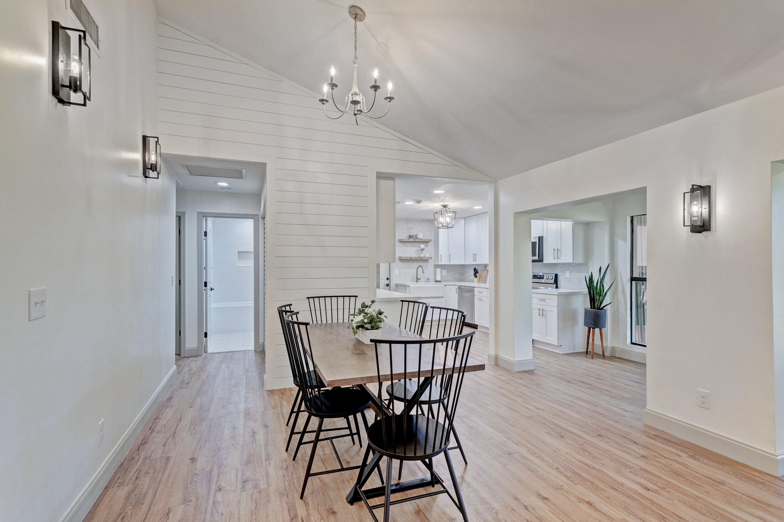 24 Ironwood Way North Palm Beach Gardens, FL 33418 - Photo 11 of 74 a view of a dining room with furniture and wooden floor