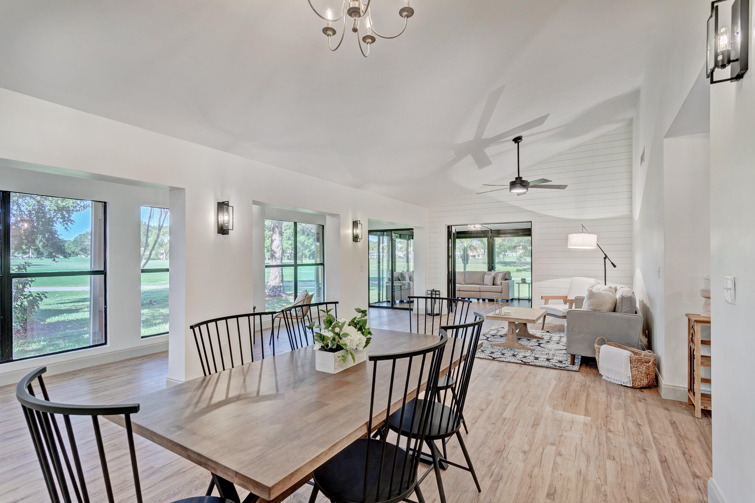 24 Ironwood Way North Palm Beach Gardens, FL 33418 - Photo 13 of 74 a view of a dining room with furniture window and outside view
