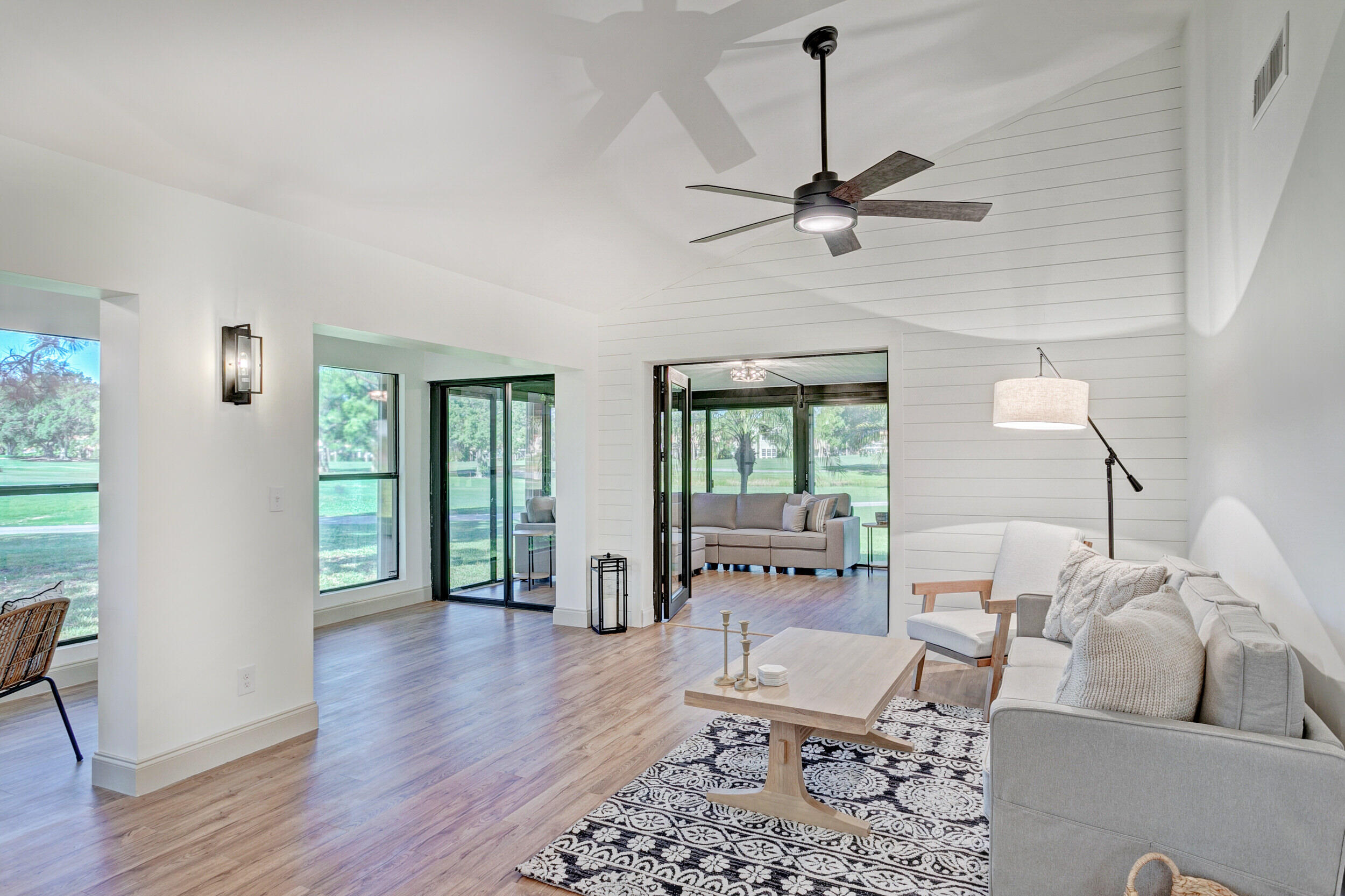 24 Ironwood Way North Palm Beach Gardens, FL 33418 - Photo 2 of 74 a living room with furniture and a window