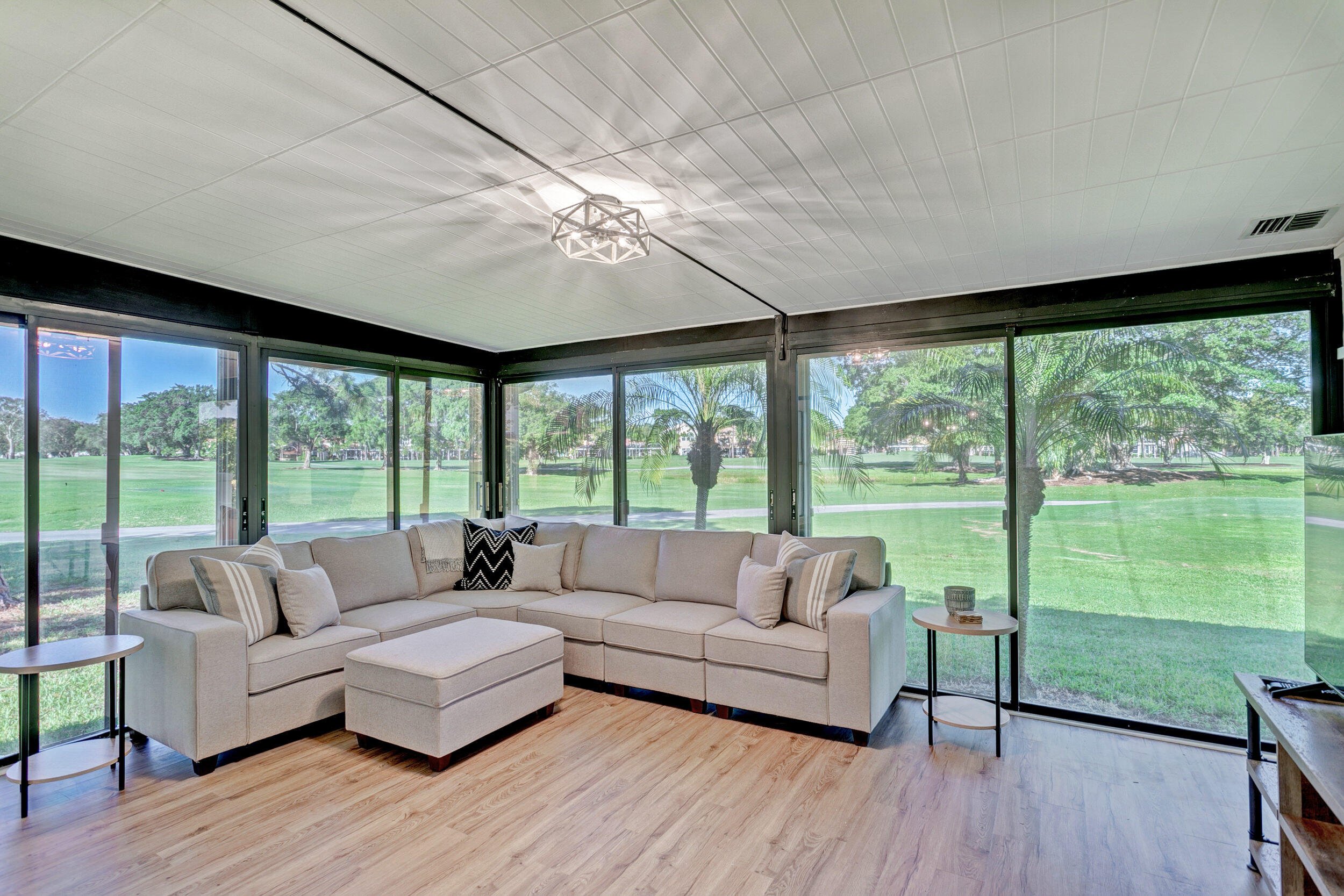 24 Ironwood Way North Palm Beach Gardens, FL 33418 - Photo 23 of 74 a living room with furniture and a large window