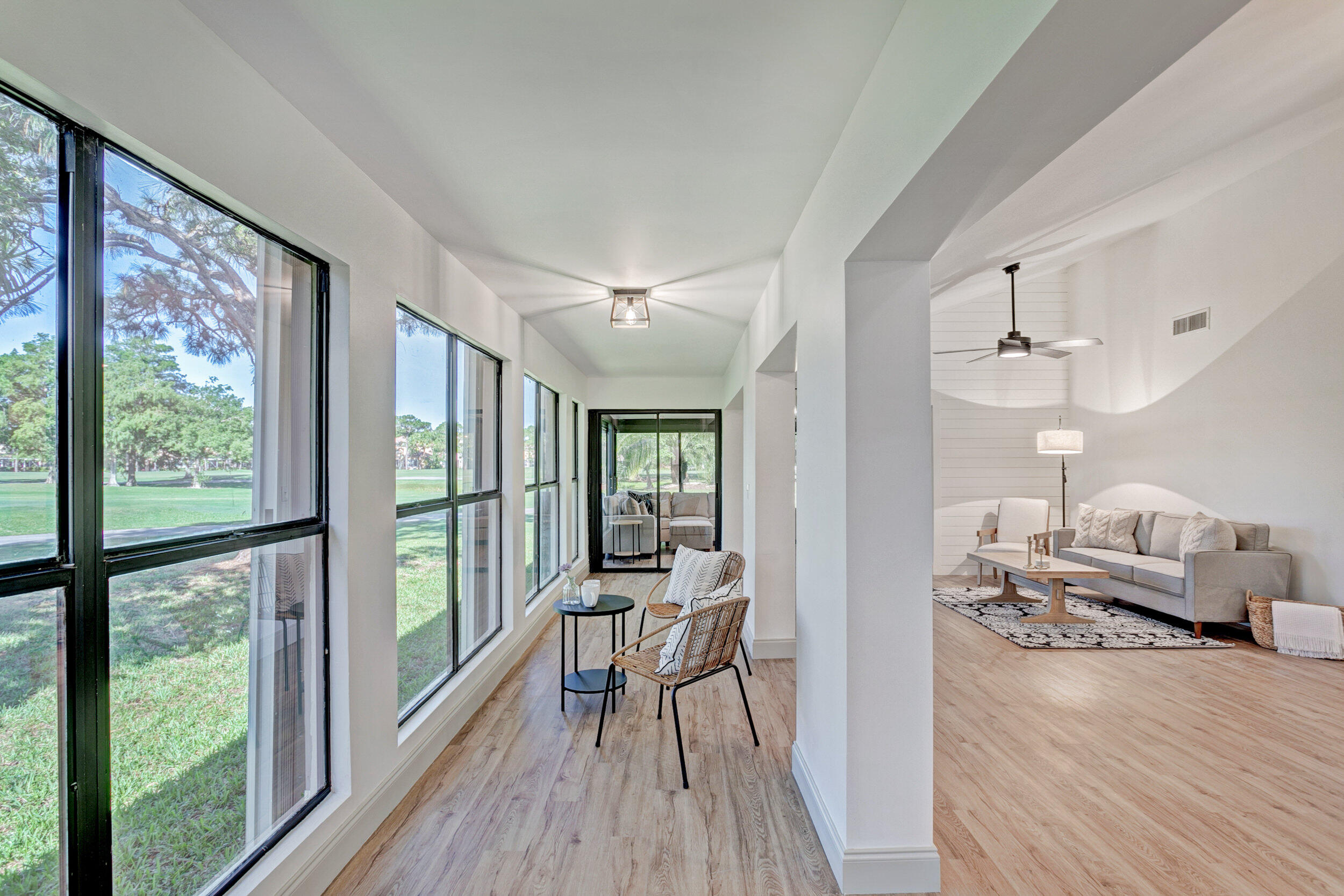 24 Ironwood Way North Palm Beach Gardens, FL 33418 - Photo 5 of 74 a view of a living room and hardwood floor