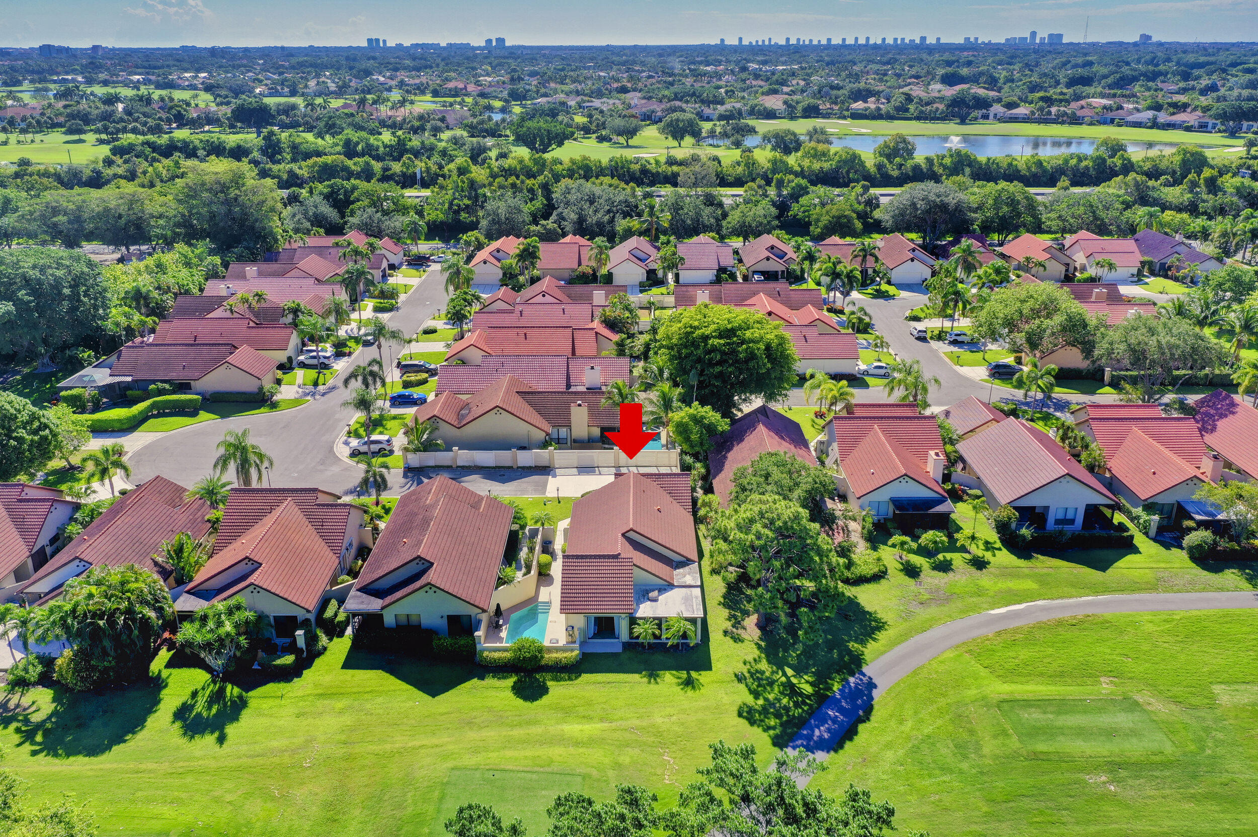 24 Ironwood Way North Palm Beach Gardens, FL 33418 - Photo 57 of 74 an aerial view of residential house with outdoor space and pool