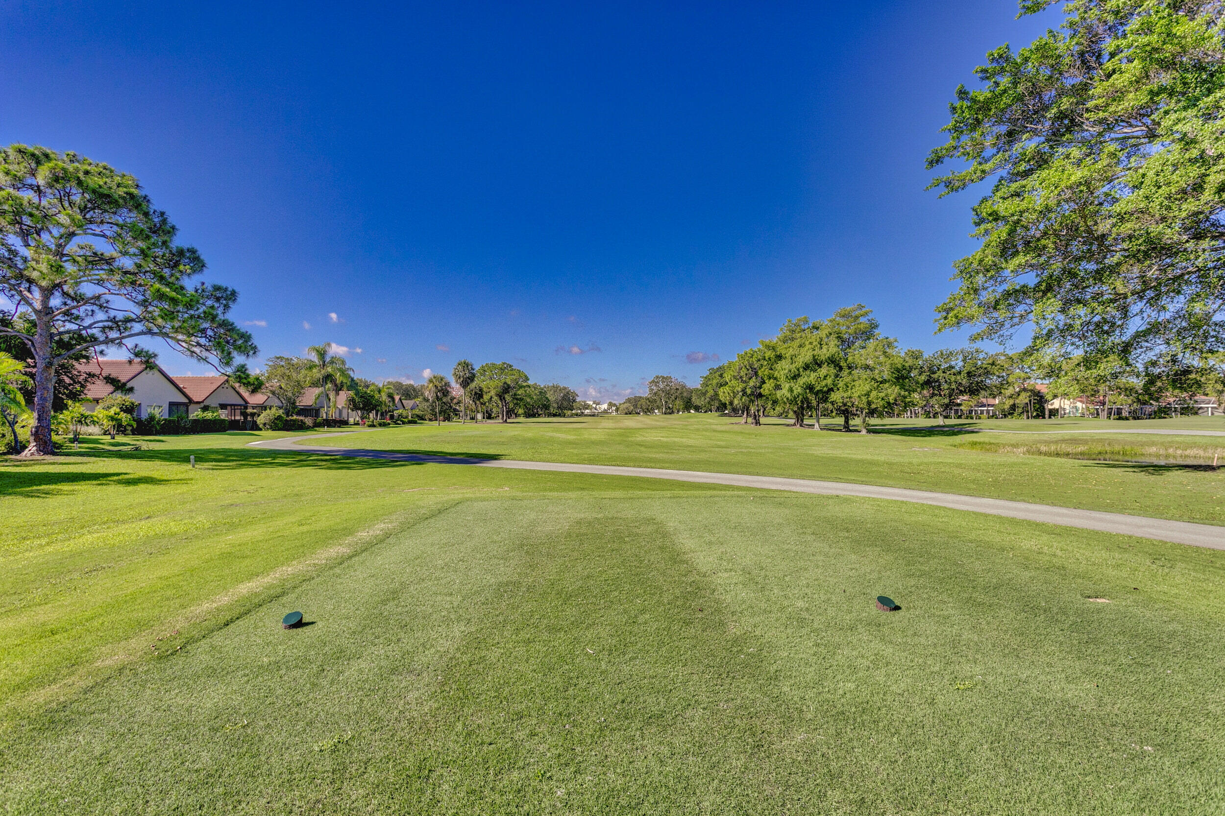 24 Ironwood Way North Palm Beach Gardens, FL 33418 - Photo 67 of 74 a view of an outdoor space and a lake view