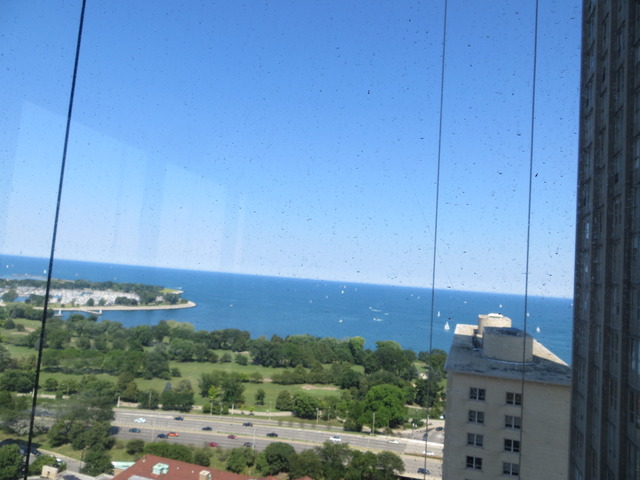 655 West Irving Park Road, Unit 2710 Chicago, IL 60613 - Photo 9 of 11 a view of a city from a terrace