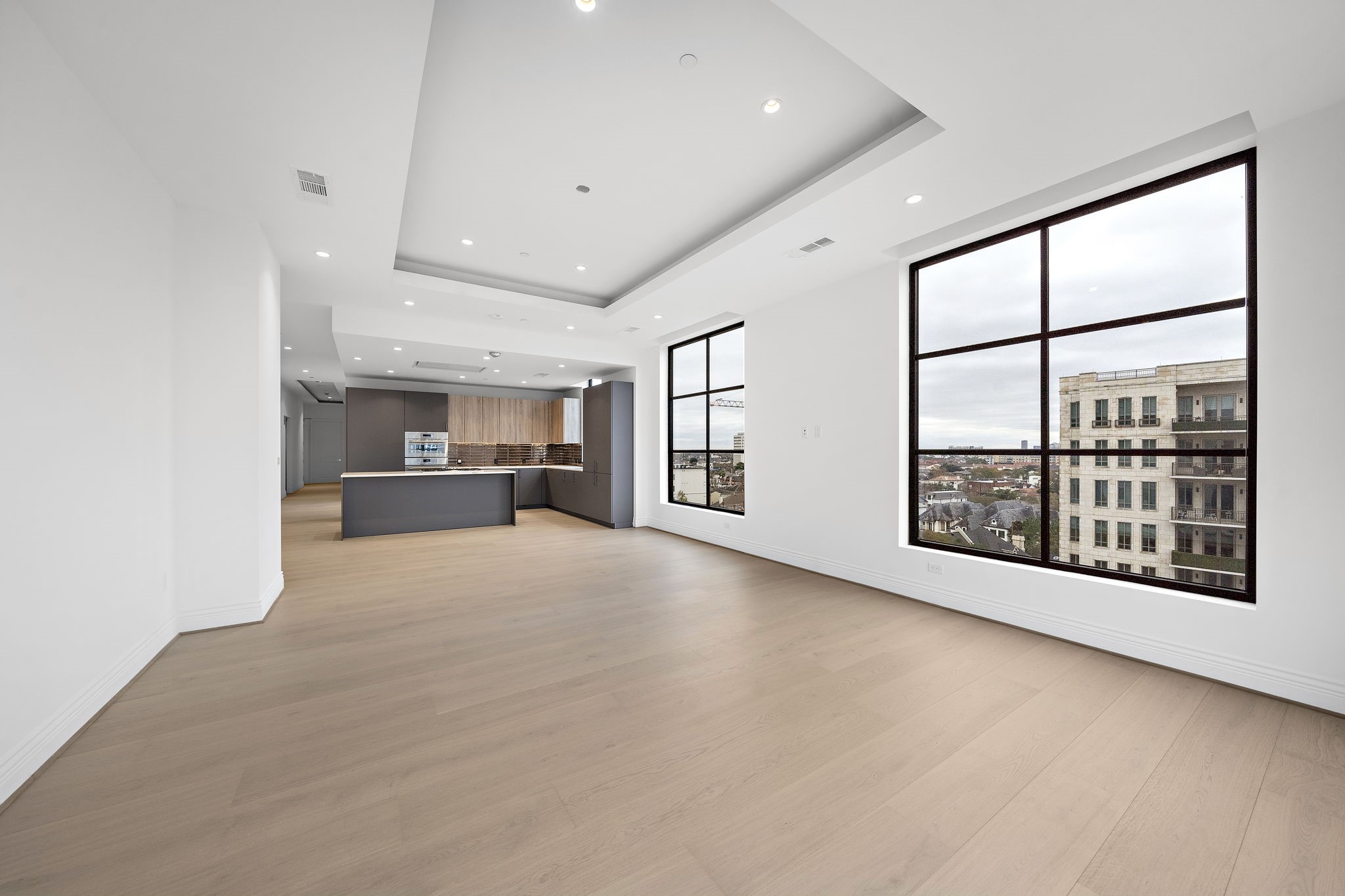 2323 San Felipe Street, Unit 803 Houston, TX 77019 - Photo 14 of 45 Perfect for entertaining, this versatile space features open sightlines from the living to the kitchen.