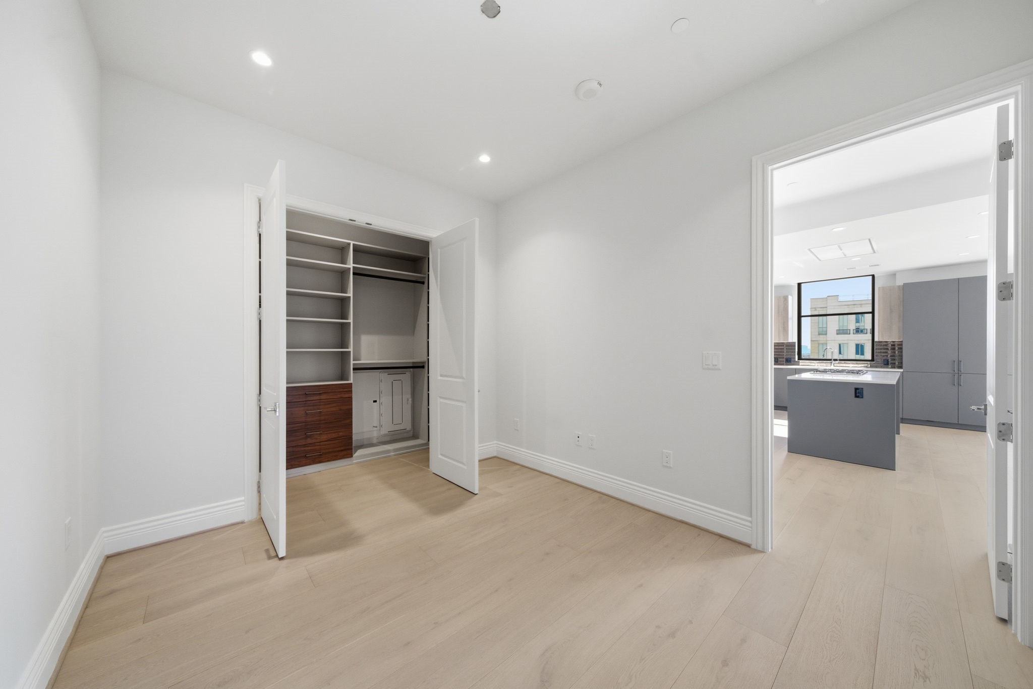 2323 San Felipe Street, Unit 803 Houston, TX 77019 - Photo 28 of 45 Third bedroom/Flex room: This versatile room, offers a perfect quiet retreat, with its cozy atmosphere. Features its own upgraded custom closet system