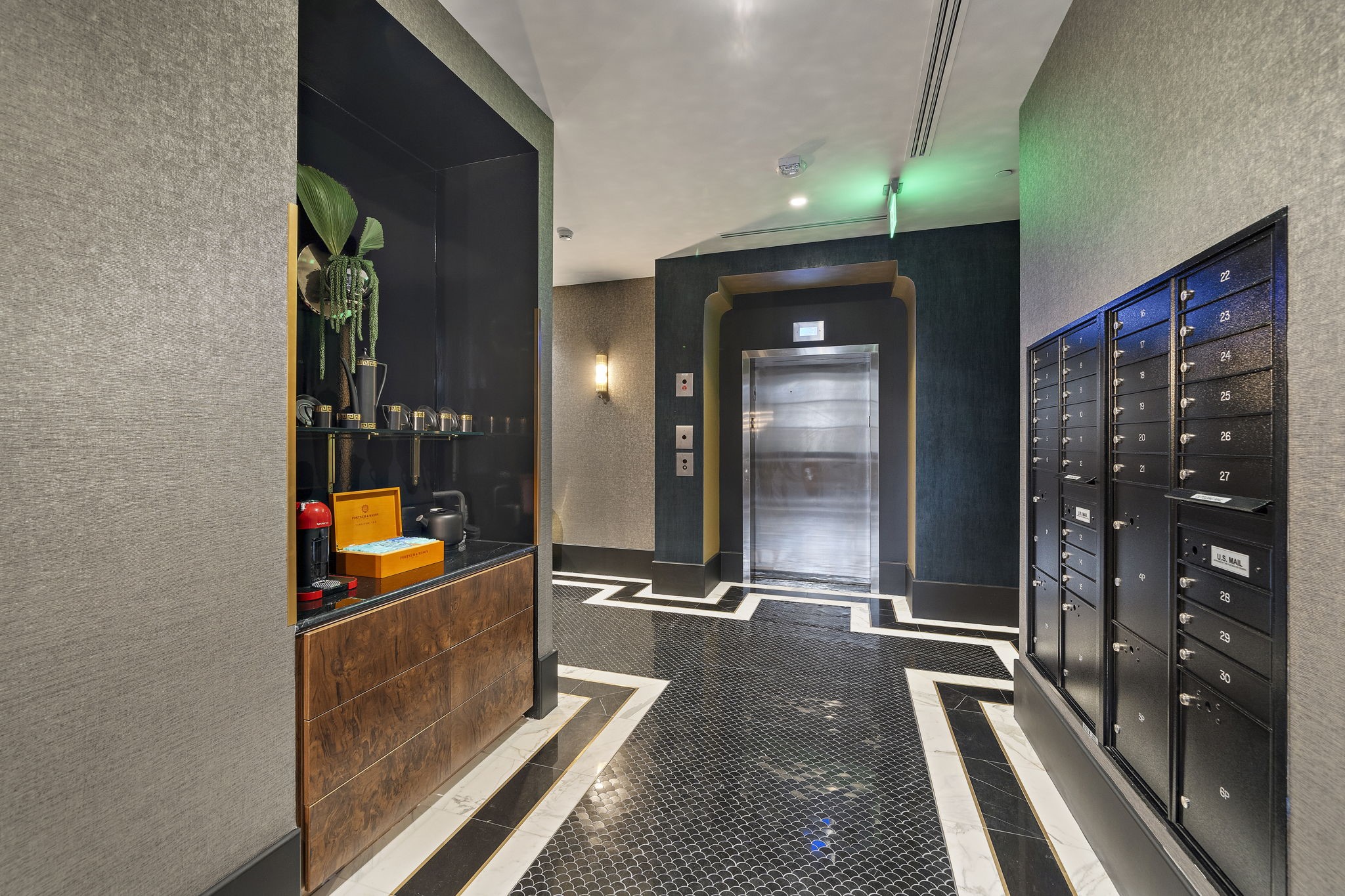 2323 San Felipe Street, Unit 803 Houston, TX 77019 - Photo 36 of 45 Lobby at London house, adjacent to the bar is a cozy coffee bar, offering a selection of coffee & teas. While mail room compliment the convenient space.