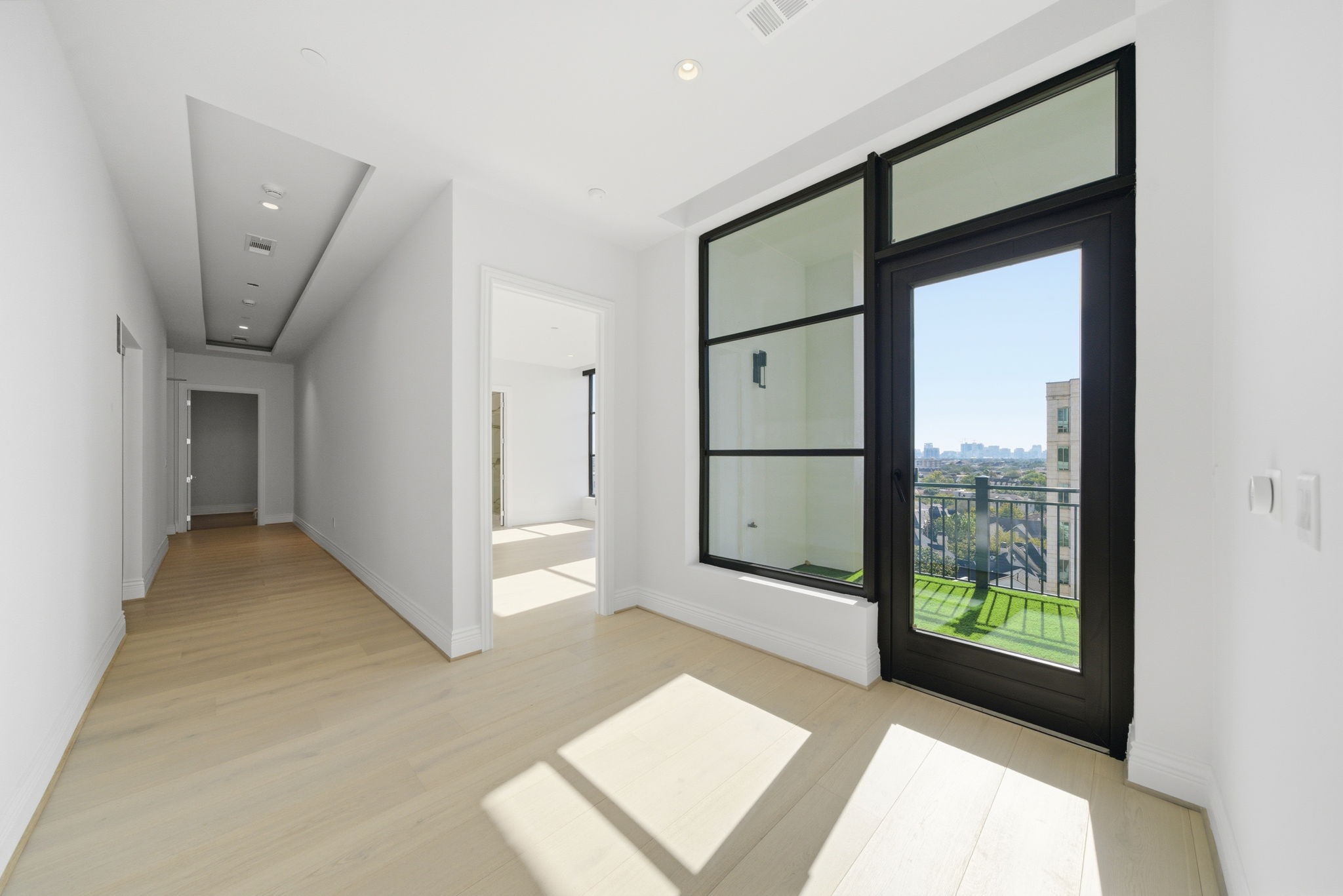 2323 San Felipe Street, Unit 803 Houston, TX 77019 - Photo 4 of 45 Entering off the private elevator, you are greeted with the covered balcony, facing Medical Center.